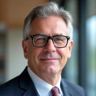 Portrait of a male Chief Financial Officer with a serious and trustworthy expression.